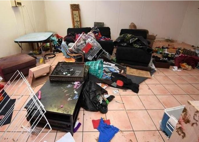 picture of messy kitchen in home bought as is for cash near tacoma wa