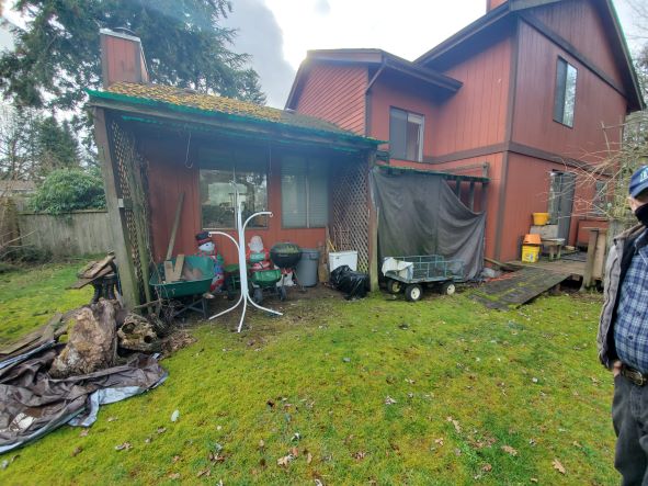 image of an old home for sell as-is in pierce county wa